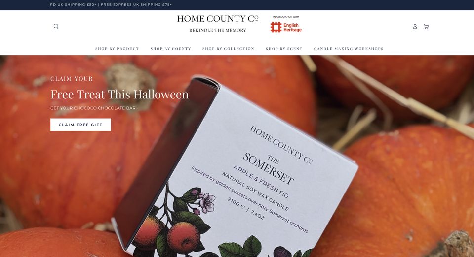 The Home County Co. homepage hero for the Halloween 2025 promotion, headed Free Treat This Halloween, over a photograph of The Somerset candle box resting on pumpkins